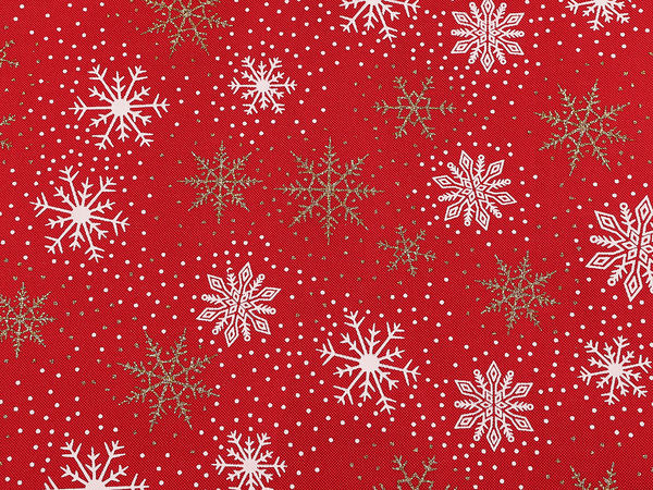 Weihnachts-Dekostoff mit glitzernden Schneeflocken